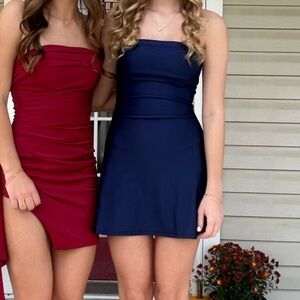 Navy blue dress on right